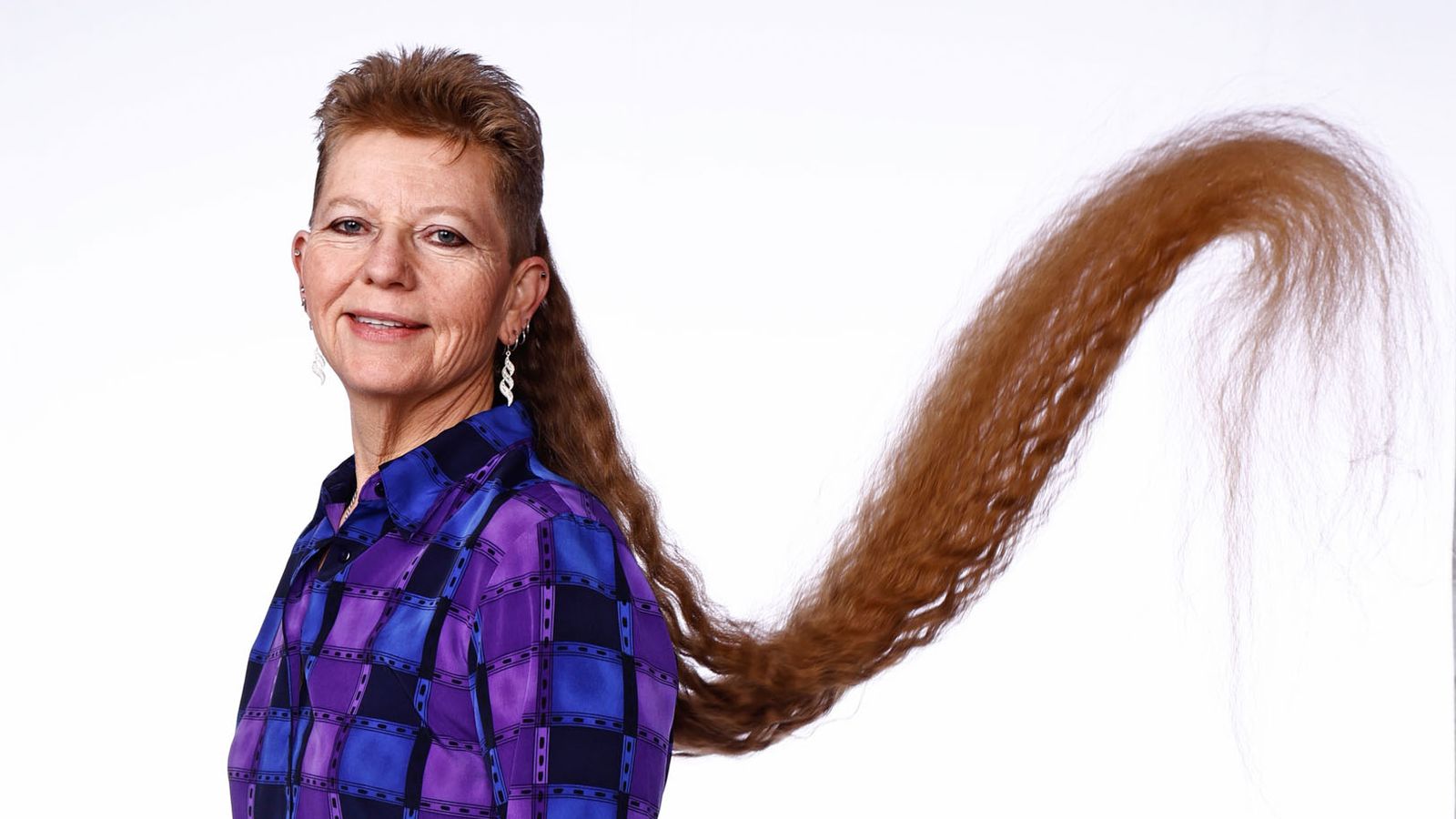 Tami Manis - Longest Mullet (Female)..Guinness World Records 2023..Photo Credit: Wade Payne/Guinness World Records